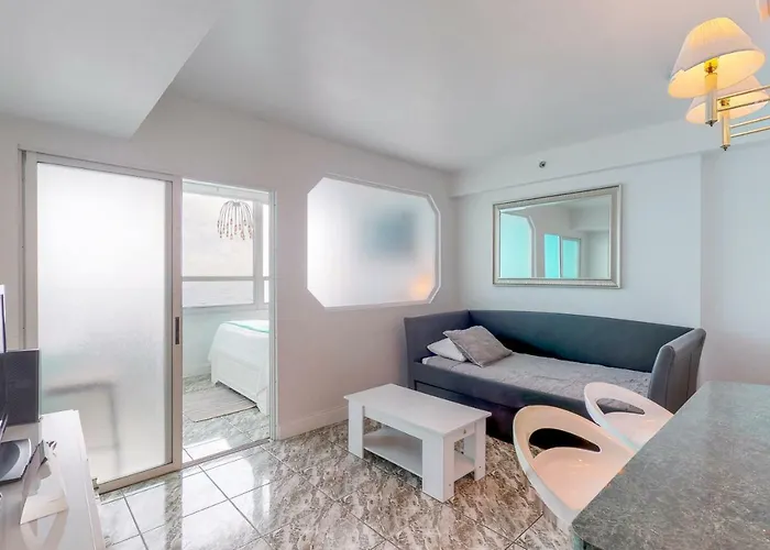 Castle Beach: Blue-Passion Flower Condo